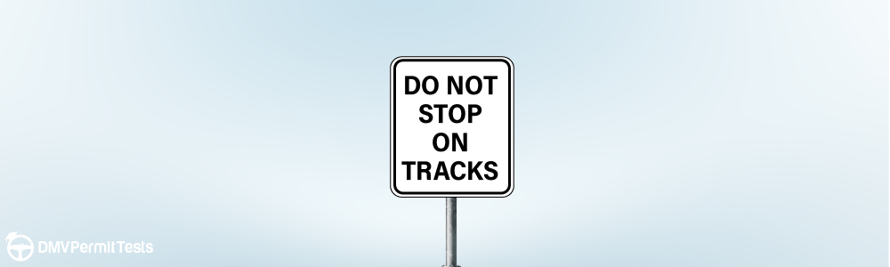 Traffic Signs - What should you do when you see this sign at a railroad crossing?